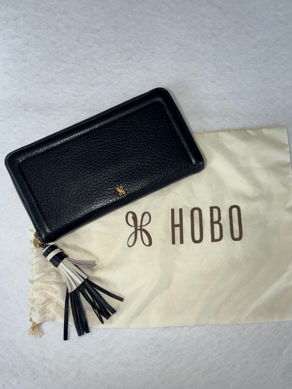Like New Nila HOBO Black Leather Zip Wallet with Black and Cream Tassel